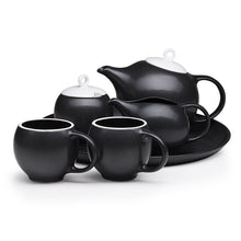 Load image into Gallery viewer, Modern tea set. Ceramic tea service in black and white. Prize winning 6-piece set.
