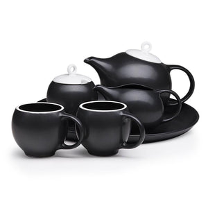 Modern tea set. Ceramic tea service in black and white. Prize winning 6-piece set.