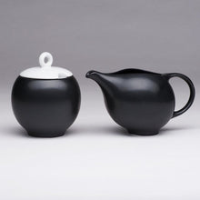 Load image into Gallery viewer, Modern tea set. Ceramic tea service in black and white. Prize winning 6-piece set.
