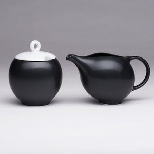 Modern tea set. Ceramic tea service in black and white. Prize winning 6-piece set.