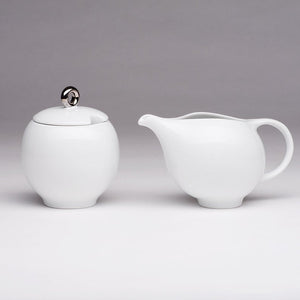Modern tea set. Ceramic tea service in white porcelain with Silver plate. Award winning 6-piece set.